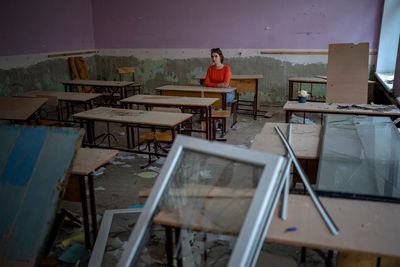 AP PHOTOS: Kids reflect on war at bombed school in Ukraine