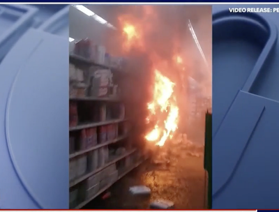 Girl, 14, arrested in connection with massive Walmart fire