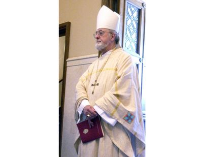 Funeral of ex-Milwaukee archbishop marked by prayer, protest