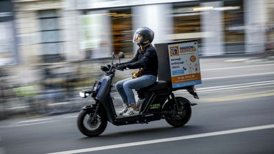 Paris makes motorcyclists pay for parking in bid to slash pollution