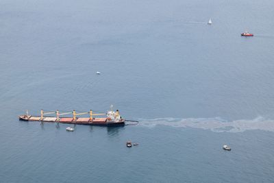 Divers seal tank vents leaking oil from bulk carrier off Gibraltar
