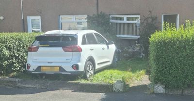 Gas leak fears after car smashes into Ayrshire house as police shut down area