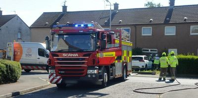 Scottish street is closed off after car crashes into front of house