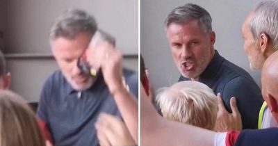 Jamie Carragher snatches phone from fan after being 'riled up' in angry exchange