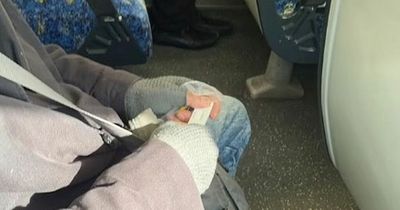 Passengers disgusted as man snapped performing Covid rapid test on TRAIN
