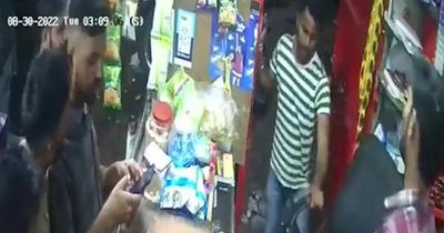 Terrifying moment man armed with SWORD attacks shopkeeper forcing scared staff to flee