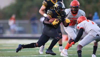 ‘Electric’ sophomore Tyler Lofton scores 5 TDs in Marian Catholic’s win against Leo