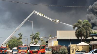 NT fire authorities say warehouse fire that put hospitals on high alert 'not suspicious'