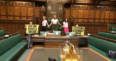 Extinction Rebellion protesters superglue themselves inside House of Commons