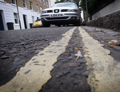 Mystery vigilante paints his own double yellow lines to stop problem parking