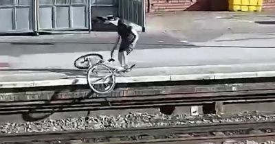 Anger as 'shocking' footage shows two kids chuck bike onto Leeds train track