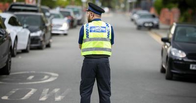 Cyclist dies after horror crash on busy Manchester road