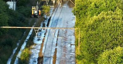 Trains cancelled and lines closed after thousands of gallons of water submerges tracks