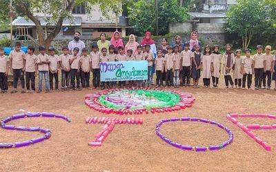 Malappuram school makes pookkalam with plastic bottles