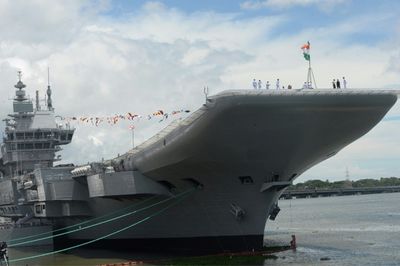 India unveils first homemade aircraft carrier, with eye on China
