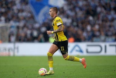 Reus helps Dortmund to top spot with goal in win over Hoffenheim