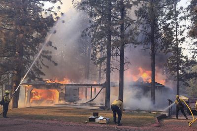 A Northern California wildfire has injured several people and destroyed homes