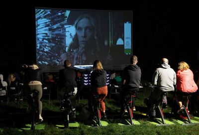 Poles pedal to power outdoor cinema as energy prices soar