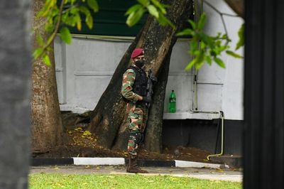 Ousted Sri Lanka leader faces arrest calls after return