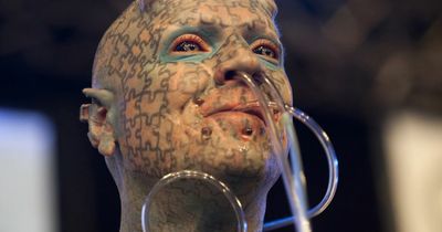 Body modification fan covers himself in more than 2,000 jigsaw piece tattoos