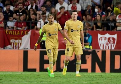 Lewandowski leads Barca to win at Sevilla as Real Madrid stay perfect