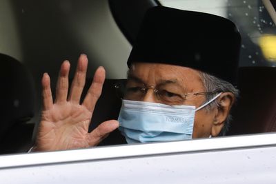 Malaysia ex-PM Mahathir, 97, discharged from hospital after COVID treatment