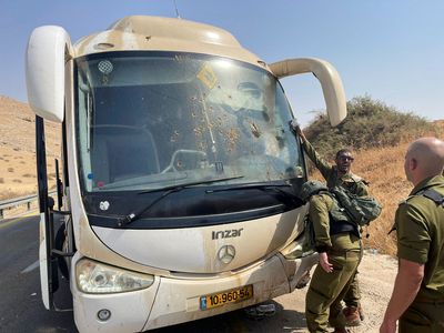 Palestinians fire on bus with Israeli troops in West Bank, 6 hurt