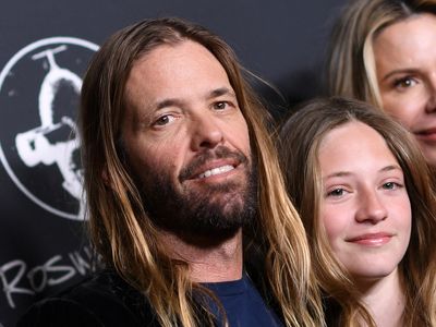 Foo Fighters perform an emotional tribute concert for drummer Taylor Hawkins