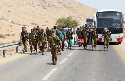 Israeli soldiers wounded in bus shooting in occupied West Bank