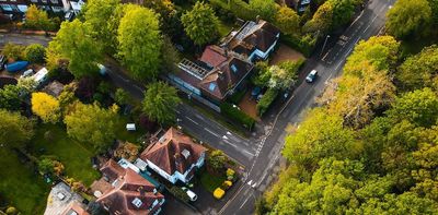 Residential green spaces protect growing cities against climate change