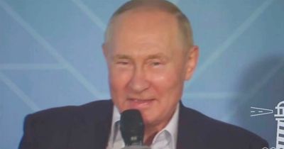 Vladimir Putin appears flushed and merry as he gives chilling message to young Russians