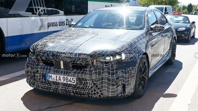 2024 BMW M5 Spied With Production Headlights, Thinner Camouflage