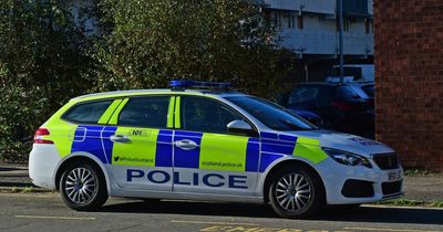 Youths broke into Glasgow police car and stole uniform items