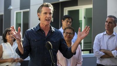 Newsom signs "groundbreaking" law for low-wage workers