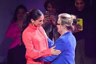 Meghan Markle opts for top-to-toe tomato red in Manchester