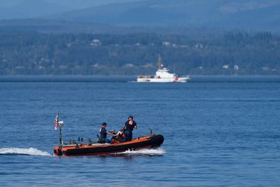 Coast Guard suspends search for nine people missing after plane crash in Puget Sound