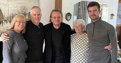 Bono delights fans as he returns to childhood home