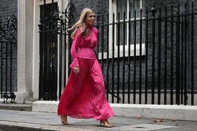 Carrie Johnson departs No10 in a billowing boho pink dress from London label Harmur