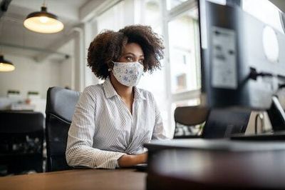 Being the only one masked in the office can be hard. A psychiatrist suggests these tips