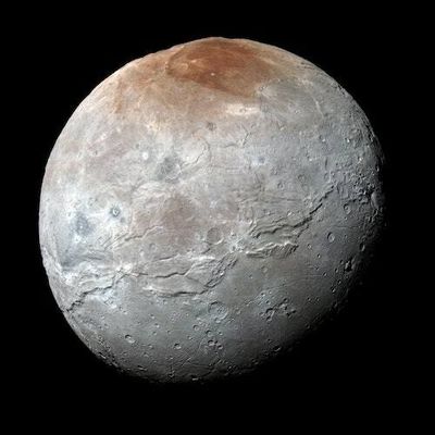 Ancient ice volcanoes may have stained Pluto’s moon blood red