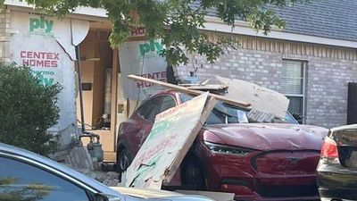 Ford Mustang Mach-E Owner Drives Through Their Garage Wall