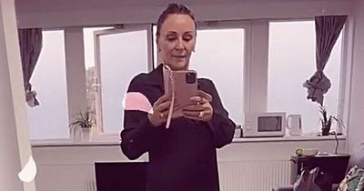 Shirley Ballas poses in nothing but a shirt as she joins stars rehearsing for Strictly