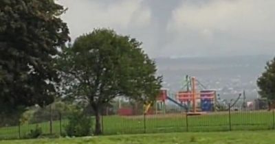 Moment tornado forms in UK town as stunned woman 'never seen anything like it'