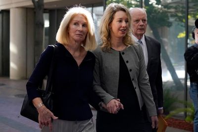 Elizabeth Holmes seeks new trial, cites key witness' regrets