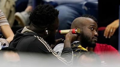 Fan Gets Haircut In Second Row of U.S. Open Match (Video)