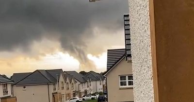 Tornado goes right by woman's house - 'never seen anything like it'