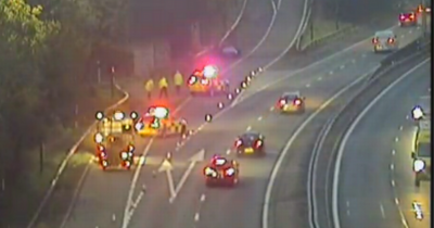 Glasgow M77 crash as woman rushed to hospital amid rush hour chaos
