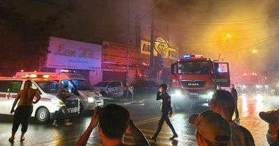 Vietnam fire: 14 dead after fire tears through karaoke bar as partygoers flee