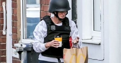 Cops offer man armed with crossbow McDonald's breakfast in bid to end 26-hour standoff