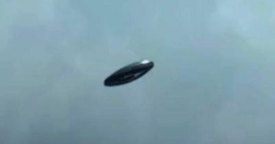 'High-res' photo of UFO shows '50ft disc' emerging from a cloud before 'vanishing into space', claims man